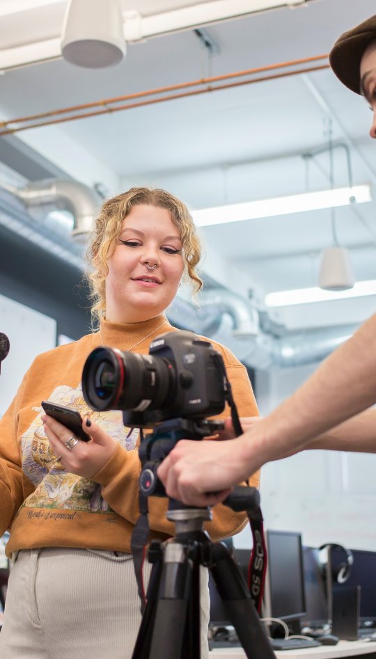 Journalism and Creative Writing students with equipment